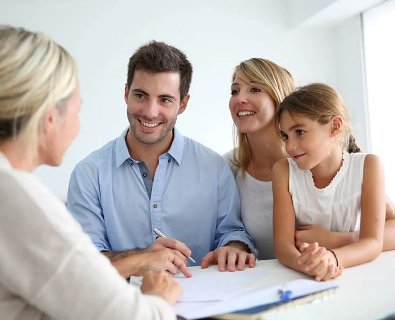 family having a meeting with Bright & Beautiful team member